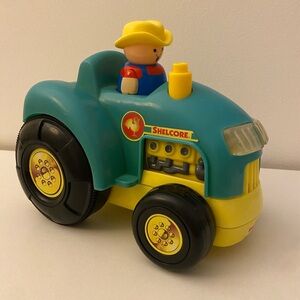 Vintage Shelcore Green & Yellow Sound Making Motorized Tractor with Farmer